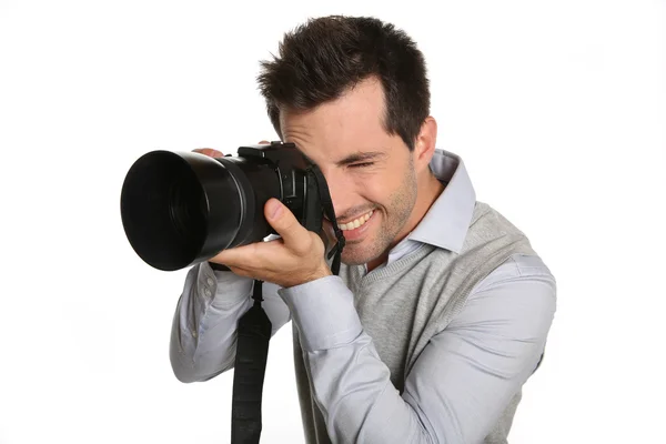 Fotógrafo segurando câmera digital — Fotografia de Stock
