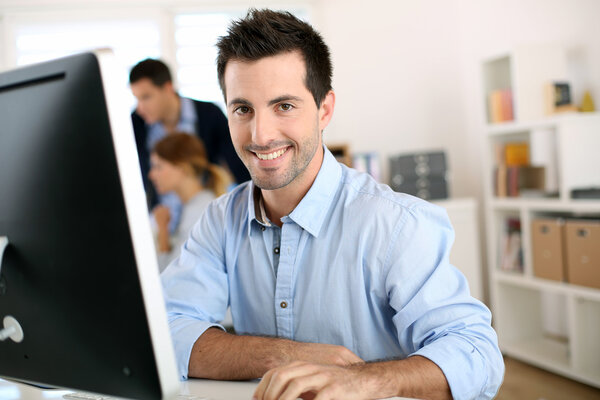 Man working on desktop computer