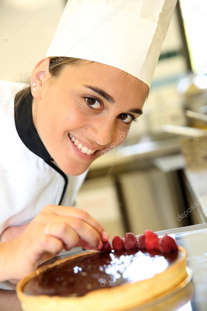 Girl at training school making cake