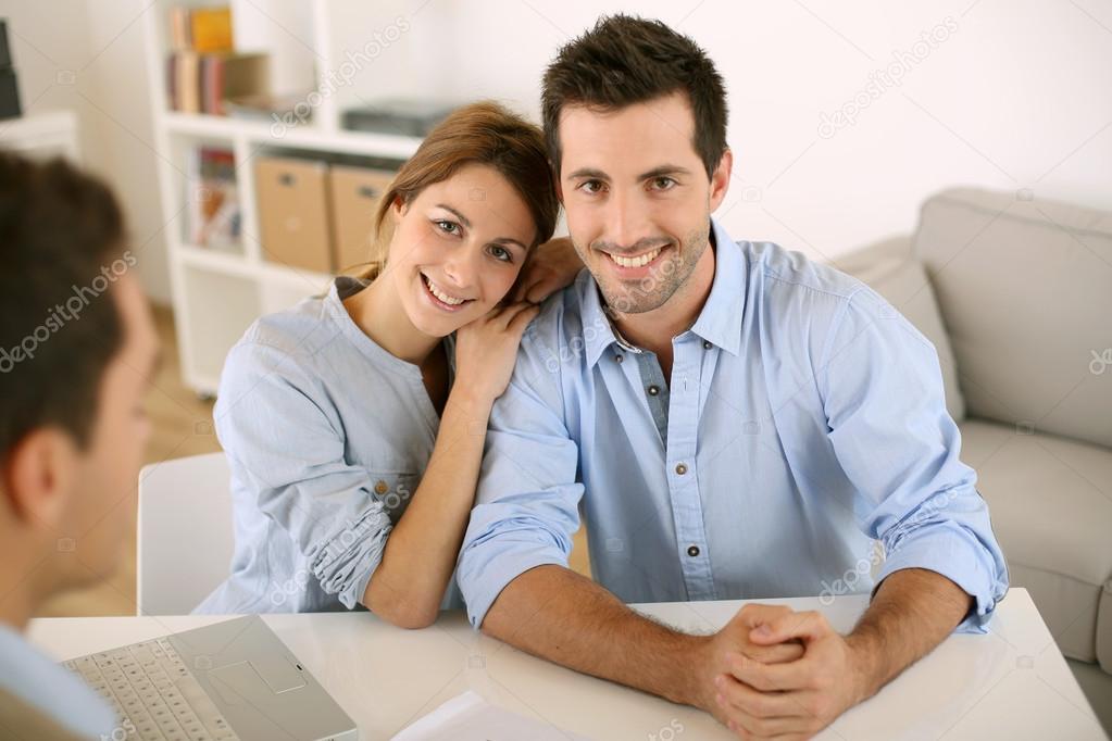 Couple in real-estate agency