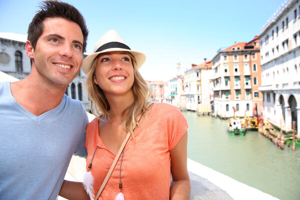 Couple of tourists on the Rialto bridge