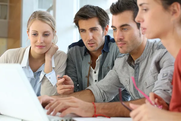Young people working together in office — Stock Photo, Image