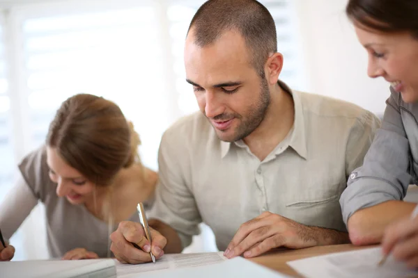 People filling admission form — Stock Photo, Image