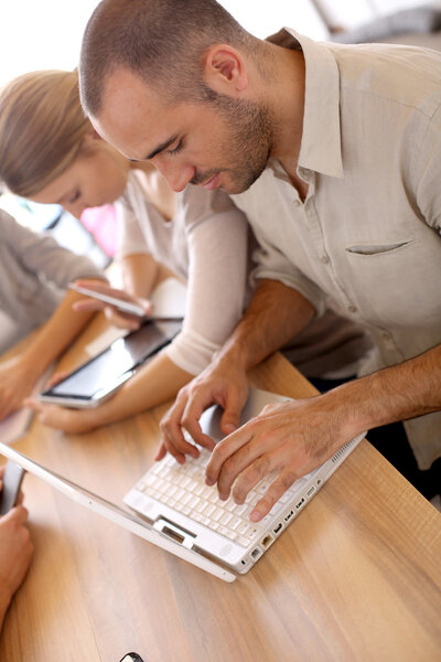 Man working on laptop computer