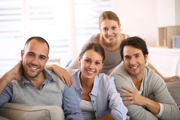 Friends sitting in sofa — Stock Photo, Image
