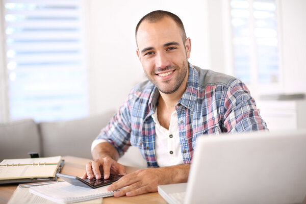 Man working on laptop computer