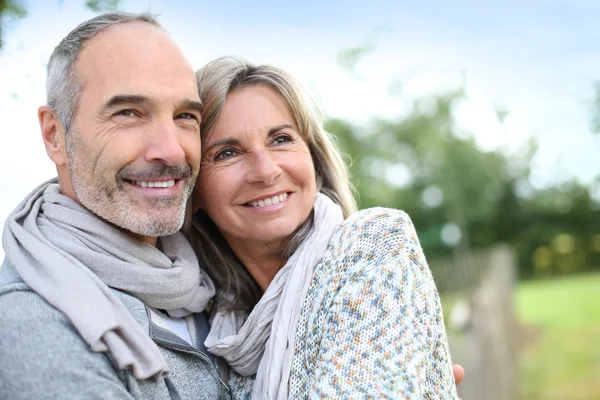 Senior couple enjoying peaceful nature