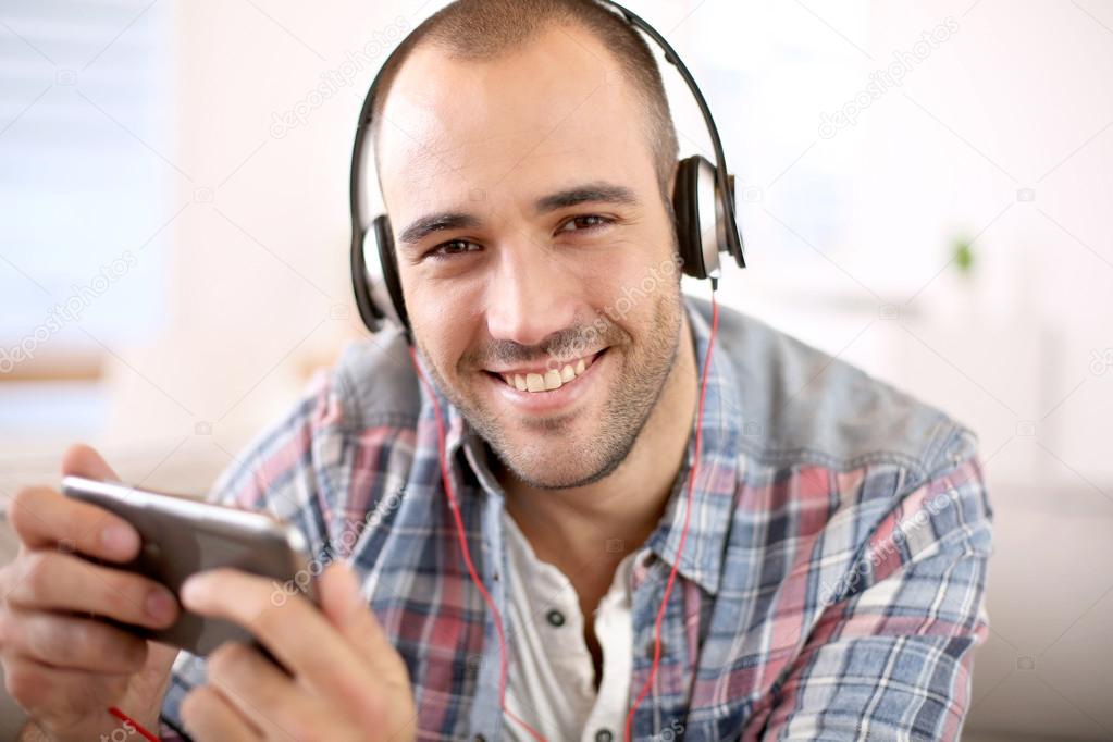Guy listening to music