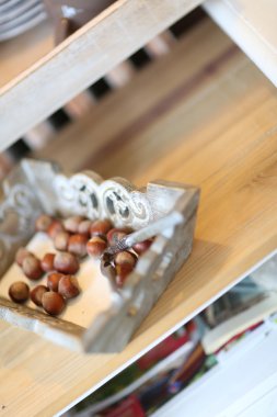 Hazelnuts on kitchen table clipart