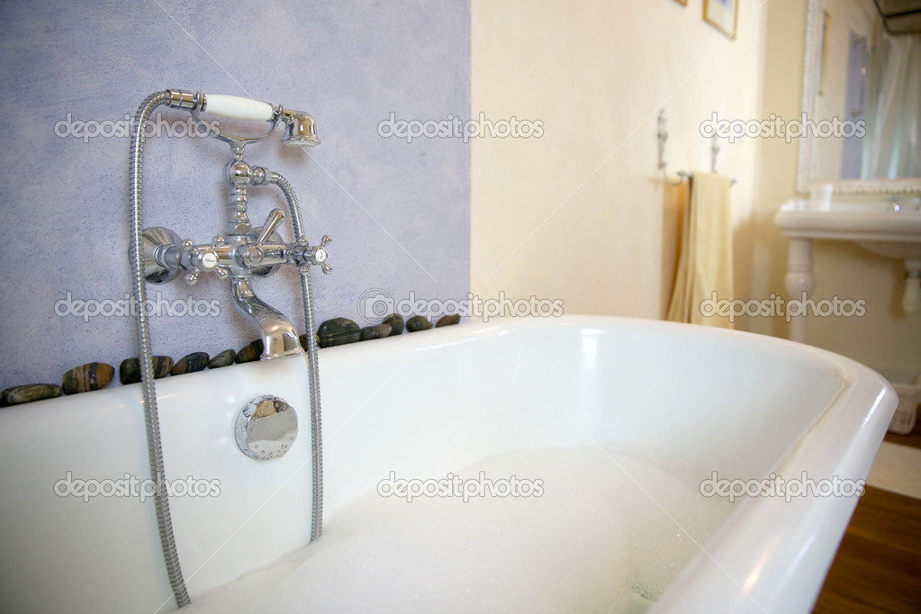 Oldfashioned bathtub Stock Photo by ©Goodluz 35328619