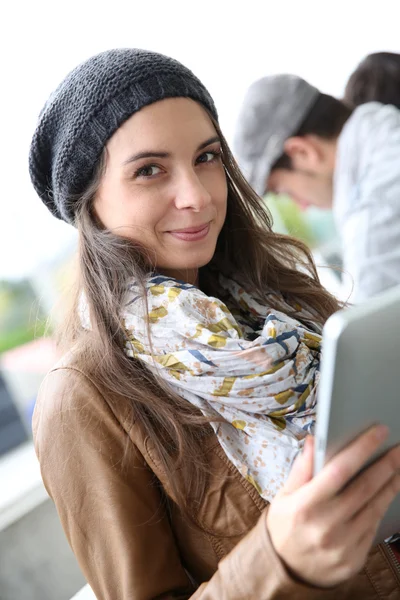 Smiling student with tablet — Stock Photo, Image