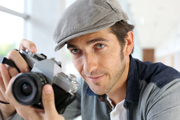 Photographer in studio — Stock Photo, Image