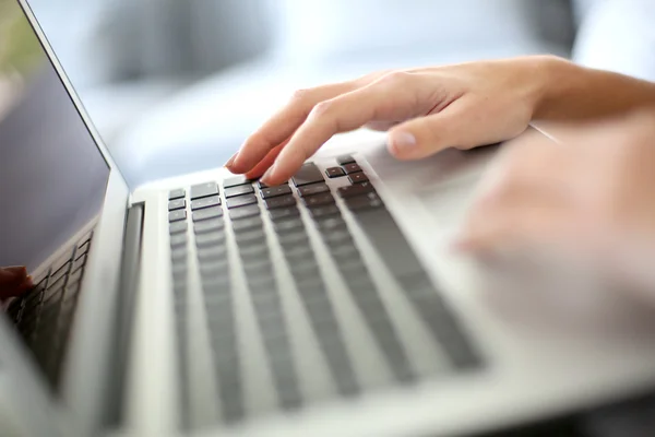 Hand typing on computer — Stock Photo, Image