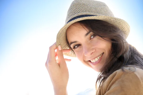 Smiling woman wearing hat — Stock Photo, Image