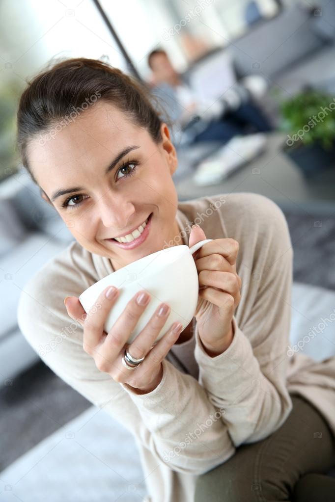 woman drinking hot tea