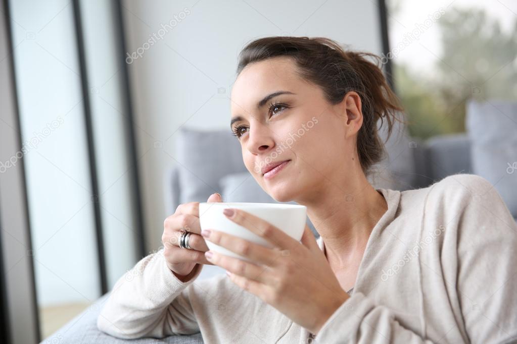 Lovely woman with cup of tea