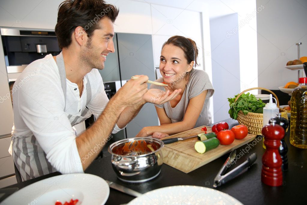 Husband and wife in kitchen