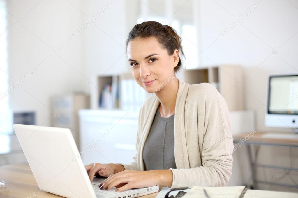 Woman working on laptop