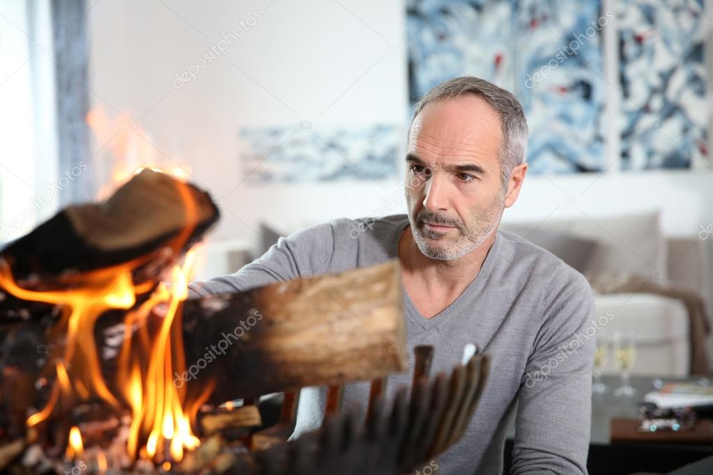 Man preparing fire