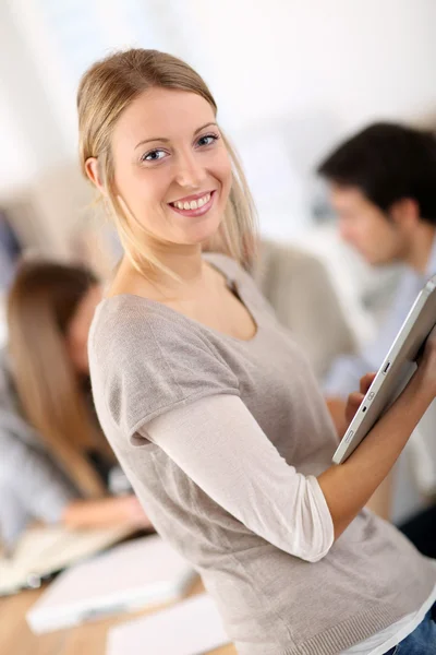 Cheerful student using tablet — Stock Photo, Image