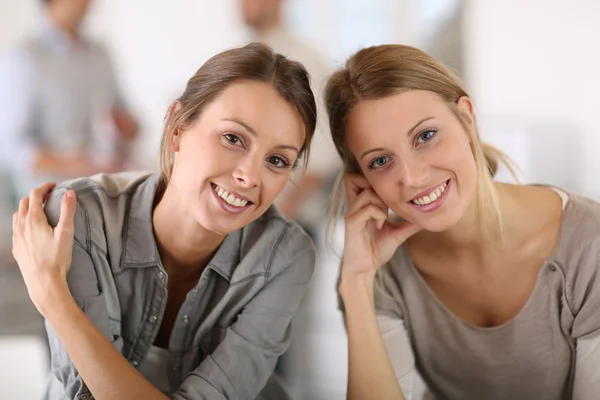Smiling girls in office — Stock Photo, Image