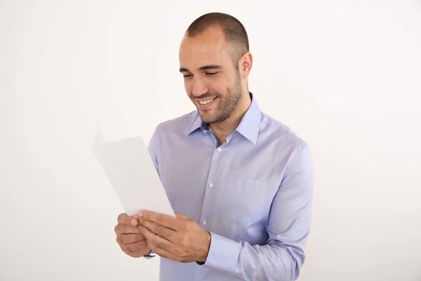 Homem segurando livreto — Fotografia de Stock