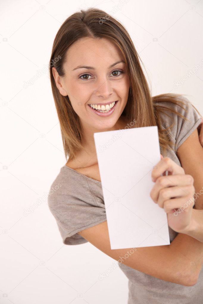 Happy girl holding leaflet for message