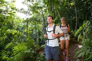 Couple on a trekking day clipart