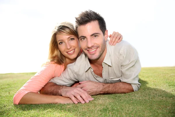 Couple relaxing in private garden — Stock Photo, Image