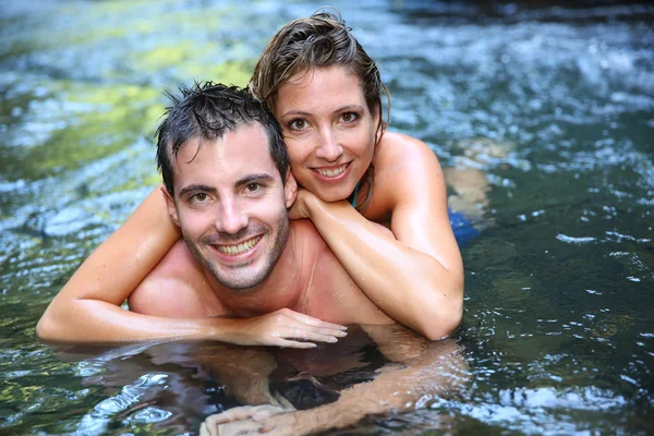 Couple bathing in river waters — Stock Photo, Image