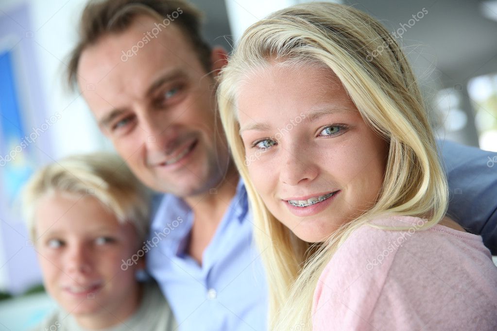Single daddy with kids Stock Photo by ©Goodluz 38960067