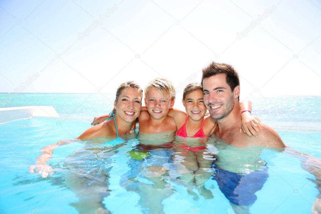 Happy family enjoying bath time