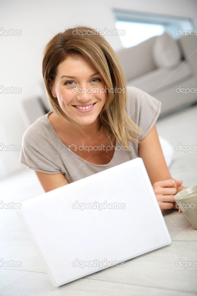 Woman websurfing with laptop