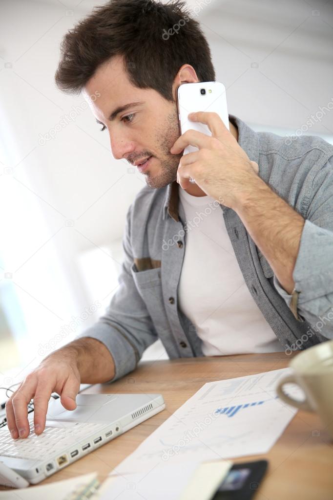 Salesman talking on phone