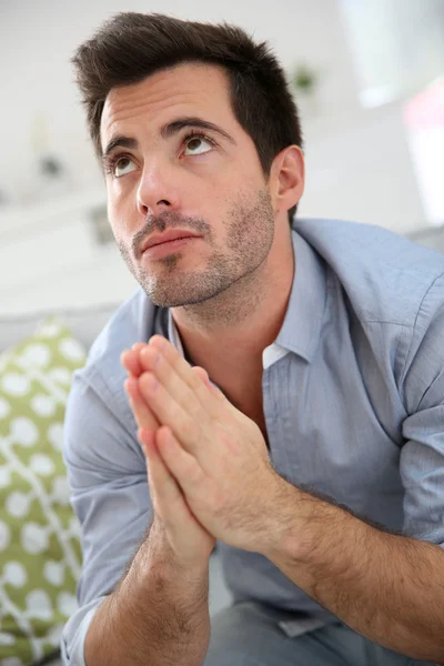 Man imploring with hands — Stock Photo, Image