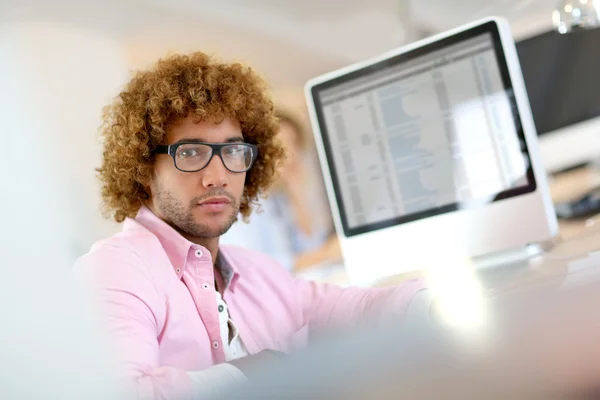 Young man in office — Stock Photo, Image