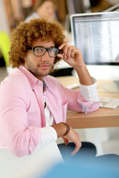 Young man in office — Stock Photo, Image