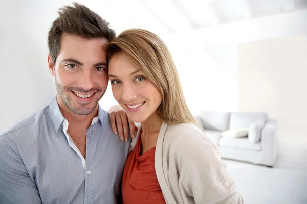 Couple standing in home Stock Picture