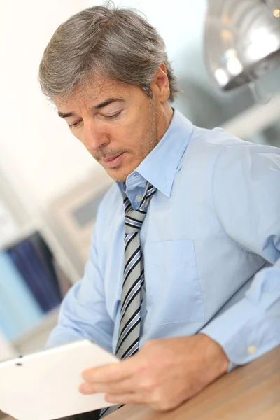 Businessman with tablet — Stock Photo, Image