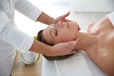 Woman having massage clipart