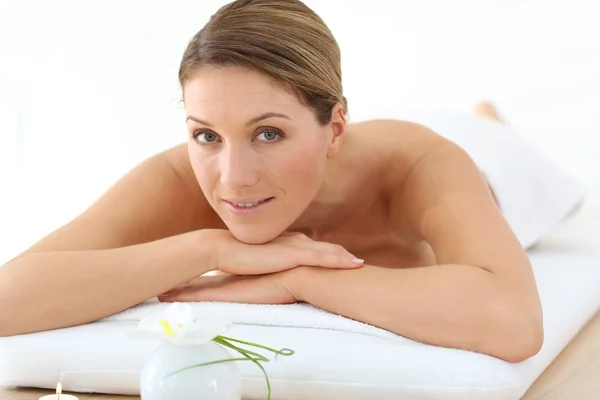 Woman on massage bed — Stock Photo, Image