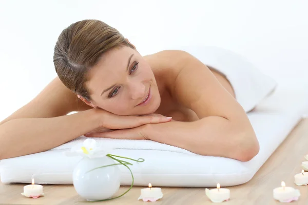 Woman on massage bed — Stock Photo, Image