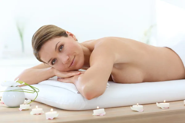 Woman on massage bed — Stock Photo, Image