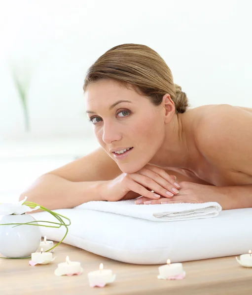 Woman on massage bed — Stock Photo, Image