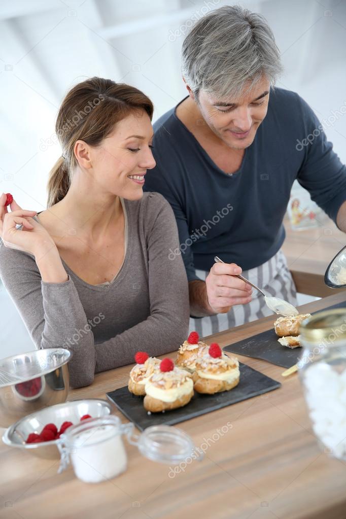 Couple preparing pastry