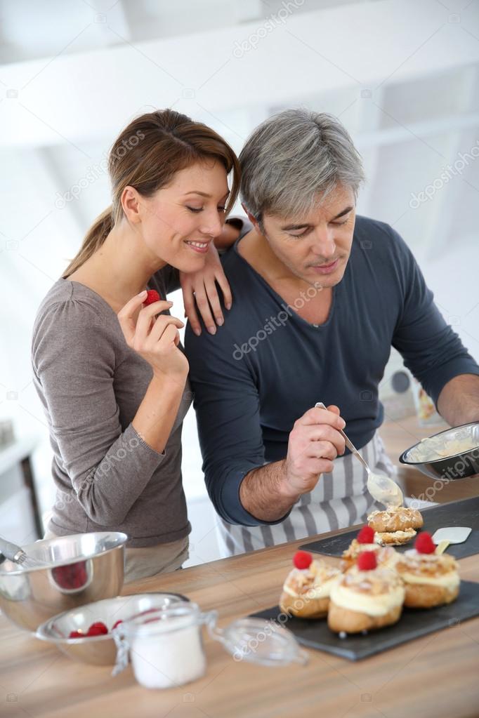 Couple preparing pastry