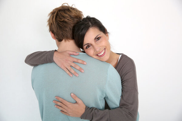 Woman embracing boyfriend