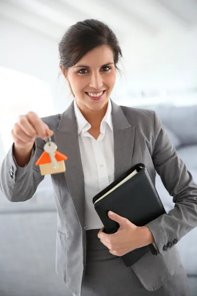 Smiling real-estate agent — Stock Photo, Image