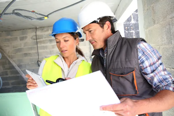 Engineers colleagues on building site — Stock Photo, Image