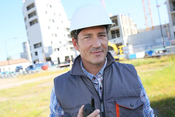 Builder on building site — Stock Photo, Image